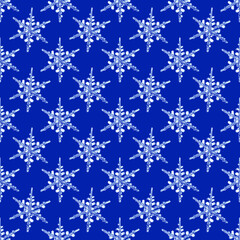 Christmas background Seamless pattern with snowflakes on a  blue background