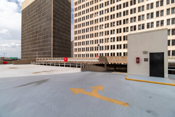 View of Rooftop Garage with Houston Building in the Background and Exit Door in the Foreground