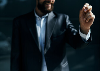 A business man outdoors holds the hand of an official close-up