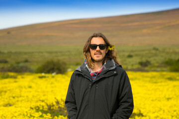 wild flowers with a carefree young man