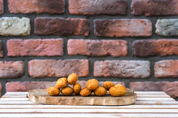 Chicken nuggets on a wooden board. Fast food concept