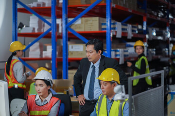 Manager with worker team working warehouse. During working hours in the warehouse, there is a checking, checking, stock for quality products, safe for customers. Women worker in warehouse concept.