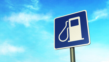 "Gas station" road sign on a metal pole, against the blue sky © Marina