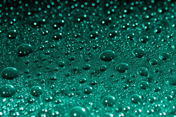 Abstract green bokeh texture on green background