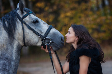 Obraz premium Girl and horse