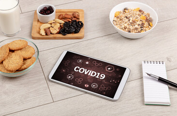 Healthy Tablet Pc compostion with COVID19 inscription, immune system boost concept