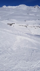 Skiing in the beautiful mountains of the Laax ski resort in Flims, Switzerland