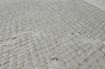 White sand texture. Sand mining background.