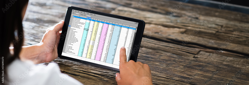 Poster spreadsheet data work online on tablet
