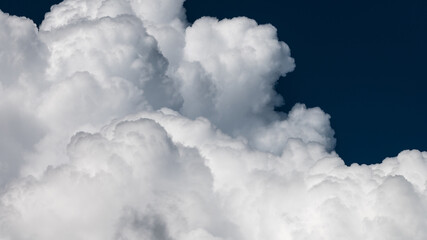 Mountainous Cumulus Clouds Boiling in the Summer Sky