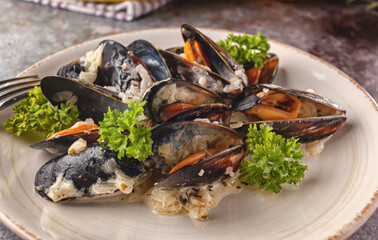 Moules Marinieres - Mussels cooked with white wine sauce.