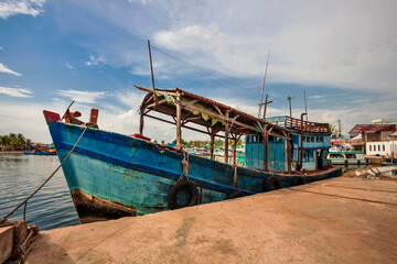 Fototapeta na wymiar Fishing boats in port at Phu Quoc island