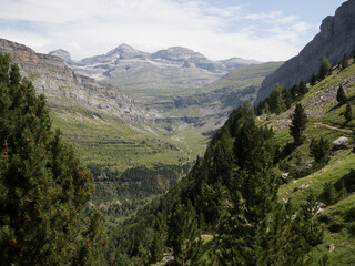 Fototapeta na wymiar Ordesa Valley in the Pyrenees with mountains in the background.