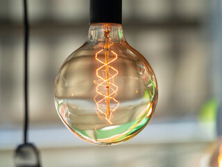 Edison vintage decorative light bulb with LED filament diffuses soft, restful light in the room