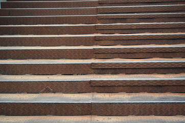 Iron staircase upstairs. Old building.