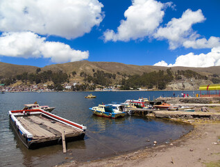 Fototapeta na wymiar Ferry to cross the Straight of Tiquina which is part of the Titicaca Lake in Bolivia