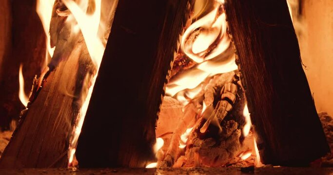 wood fire in a large fireplace