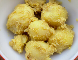 Top view of Boiled Potatoes with butter and sour curd Food Photography