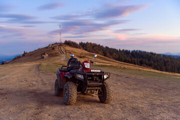ATV Quad Bike in front of mountains landscape. Selective focus © gorynvd