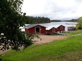Fototapeta na wymiar Red boat houses in Virrat Finland