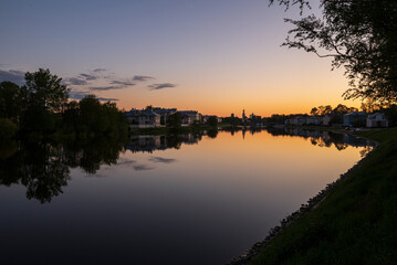 Fototapeta na wymiar Beautiful sunset on the banks of the Vologda river. 