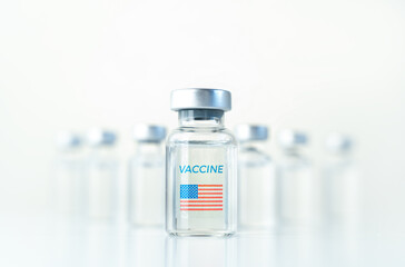 Transparent vials with USA flag. Vaccine for covid-19 coronavirus, flu, infectious diseases. Injection after clinical trials for vaccination of human, child, adult, senior. Medicine, drug concept