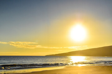 idyllic sunset on the pacific coast in hawaii