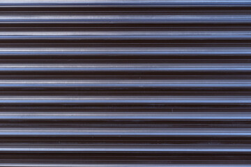 Obraz premium Black iron tin fence lined background. Metal texture