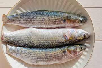 Fresh sea fish pelengas ready for frying.