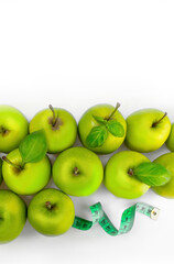 Body tape measure and apple.