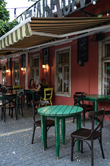Summer street cafe interior in the street, ornate with decorative elements