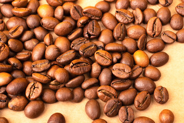 Roasted Coffee beans background close up. International coffee day concept. Macro photography....