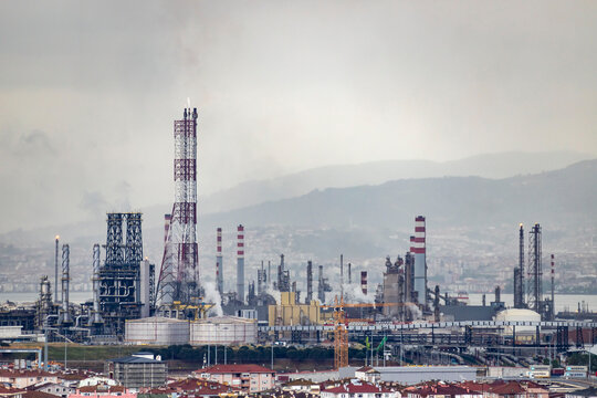 Oil refinery factory on the sea in Izmit, Turkey. Petrochemical plant structure on manufacturing oil refinery. Tupras Izmit petroleum refinery. Tupras is Turkey's largest oil refinery.