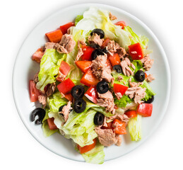 Tuna salad with tomatoes, black olives, and greens isolated in white background. Top view