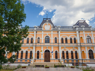 Fototapeta premium The Manuc Bei mansion, an architectural, culture and historic complex with museum, winery and other edifices located in Hincesti city, Moldova. Manuc Bey palace facade and yard in a sunny summer day.