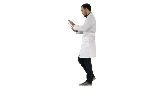 Doctor Using Tab While Walking On White Background.