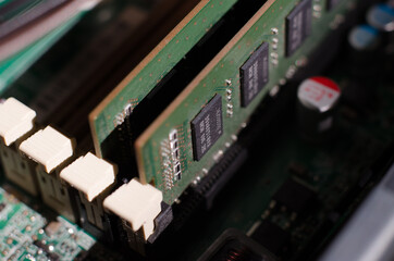 Random access memory of a personal computer macro photo with selective focus. Computer equipment repair.
