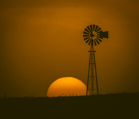 Windmill in countryside at sunset, Pampas, Patagonia,Argentina.