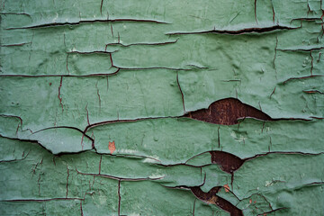 Green rusty grunge metal background or texture with scratches and cracks