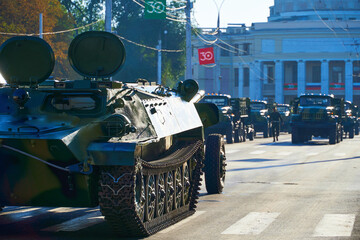 Fototapeta premium military parade in the city, ordered military equipment, tanks, guns and other weapons in the street for celebration