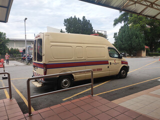 SEREMBAN, MALAYSIA -SEPTEMBER 6, 2020: Malaysian ambulans parked at the hospital. Malaysian ambulances use modified van vehicles. © Aisyaqilumar