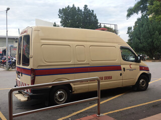 SEREMBAN, MALAYSIA -SEPTEMBER 6, 2020: Malaysian ambulans parked at the hospital. Malaysian ambulances use modified van vehicles. © Aisyaqilumar