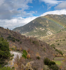 Fototapeta na wymiar The rainbow in the mountains