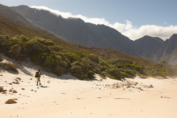 Long shot of disabled Black African American male athlete walking