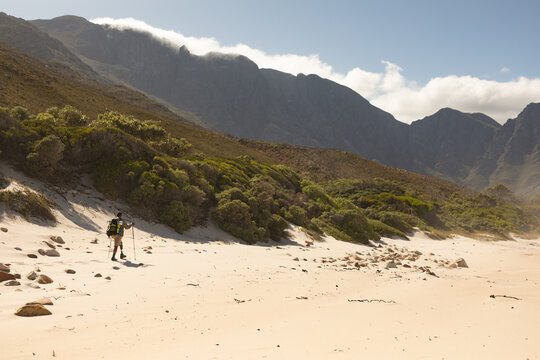 Long shot of disabled Black African American male athlete walking