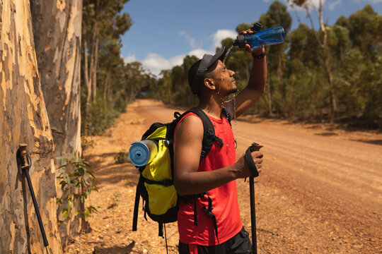 Disabled Black African American male athlete pouring water