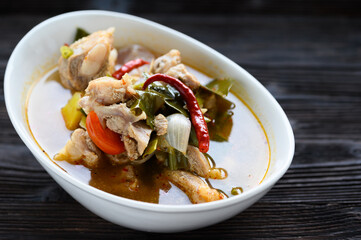 Thai food Pork spare rib Spicy soup in white bowl.
