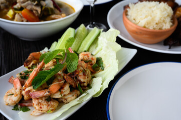 Thai food - spicy Shrimp salad with garlic and basil