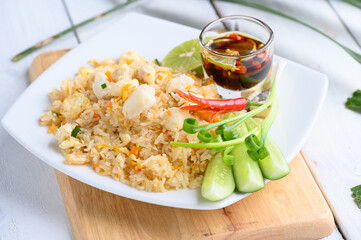 Crab Fried Rice On A White Plate