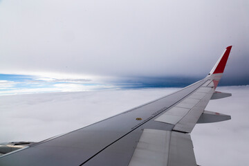 Fototapeta na wymiar Cloudy Sky from the plane